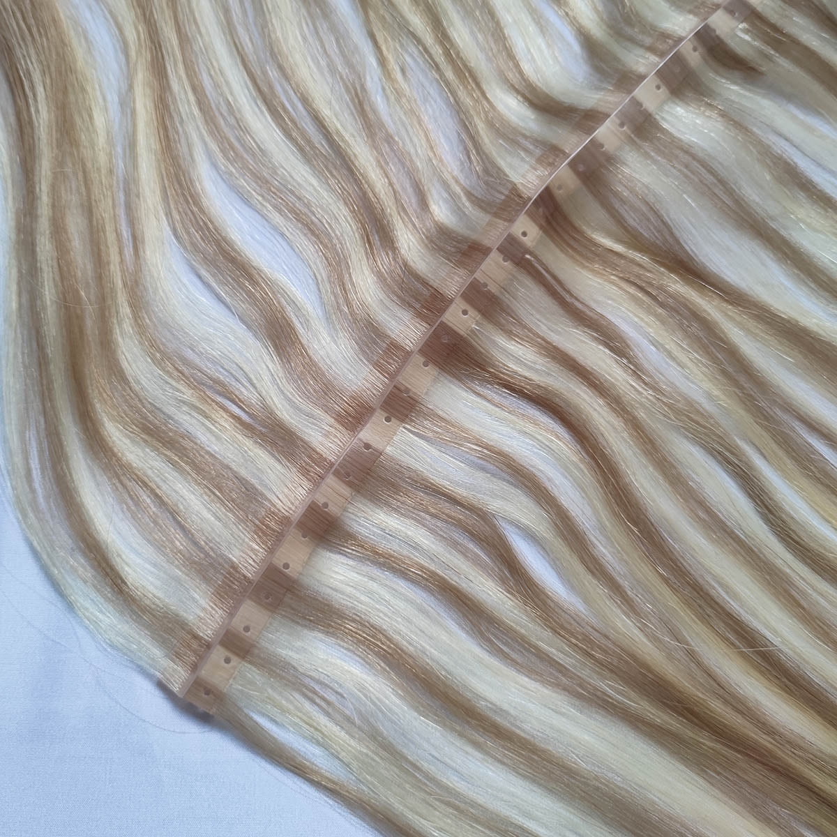 Butterfly XO Invisible Weft Extensions Platinum Blonde With Brown Root